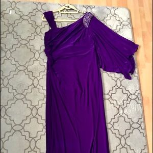 Beautiful purple formal dress .